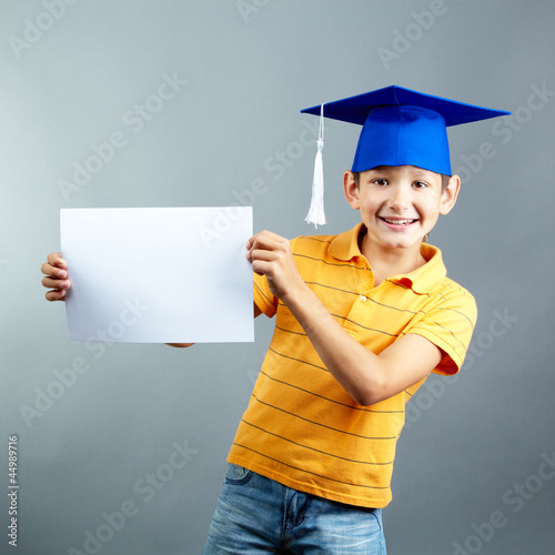 Photo: Schoolboy with blank paper Schoolboy with blank paper
