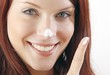 beautiful young woman with creme