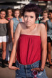 Sad Girl with Hunched Shoulders