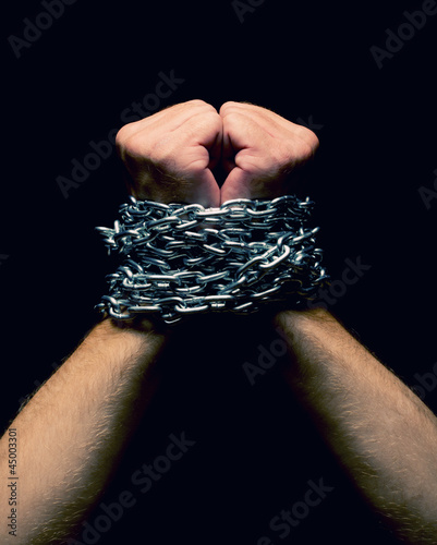 Photo: Rised up chained hands Rised up chained hands