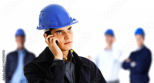 Photo: Engineer talking on the phone Engineer talking on the phone