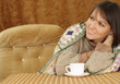 Nice Caucasian woman on a sofa