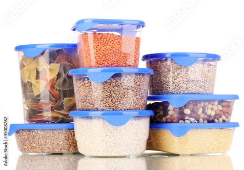Photo: Filled plastic containers isolated on white Filled plastic containers isolated on white