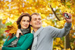 young people Couple at autumn outdoors