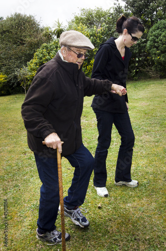 Photo: Assisting and helping elderly people Assisting and helping elderly people