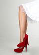 Woman's Crossed Legs Wearing Heels