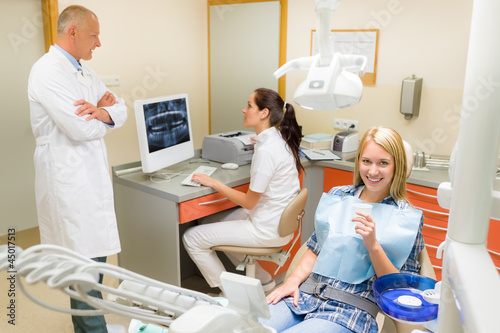 Photo: Smiling patient at dentist surgery Smiling patient at dentist surgery