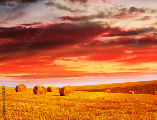 Photo: red sky over hay bales red sky over hay bales