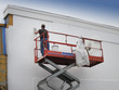 Photo: Contractor plasterer finishing a commercial building Contractor plasterer finishing a commercial building