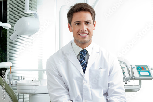 Photo: Happy Male Dentist In Clinic Happy Male Dentist In Clinic