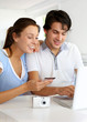 Couple having their pictures developed on internet