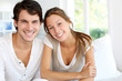 Portrait of smiling young couple at home