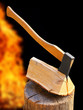 Foto: Cut log fire wood and old axe. Renewable resource of a energy. Cut log fire wood and old axe. Renewable resource of a energy.