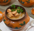 Chanterelle soup puree served with croutons