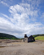 Old abandoned ruined miner's cottage