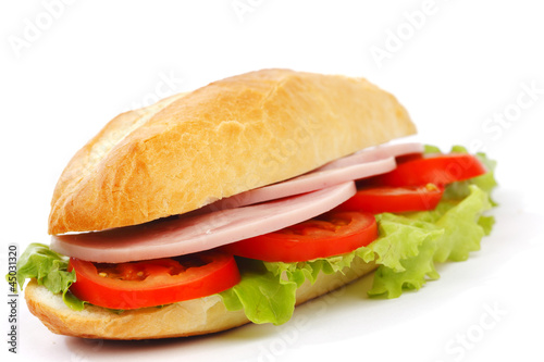 Photo: Closeup of sandwich with ham and fresh vegetables Closeup of sandwich with ham and fresh vegetables