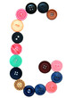 The alphabet from buttons for sewing.