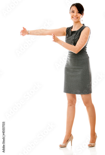 Photo: Businesswoman showing a gap Businesswoman showing a gap