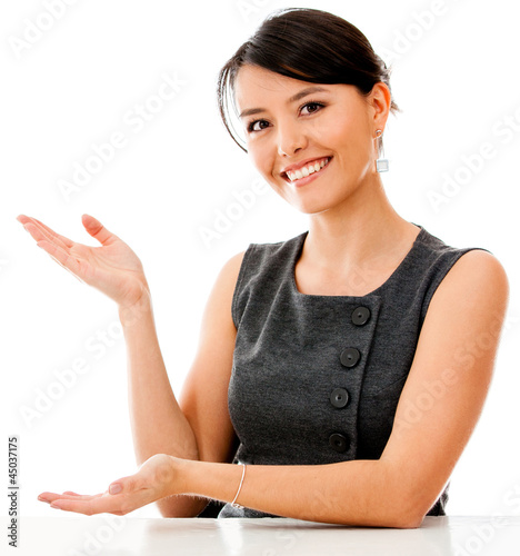 Foto: Business woman displaying something Business woman displaying something