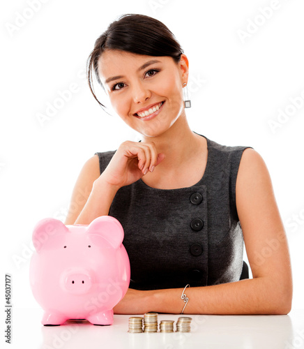 Photo: Business woman saving money Business woman saving money