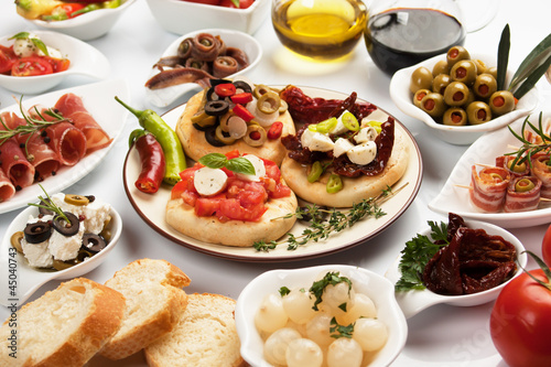 Photo: Table full of appetizers Table full of appetizers