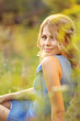 Girl sitting in the grass