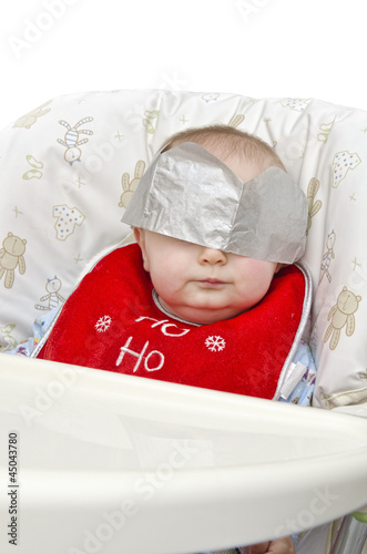 Photo: Baby in a Christmas hat Baby in a Christmas hat