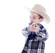 Young boy dressed as a cowboy
