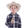 Young boy dressed as a cowboy