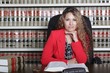 Photo: Female Hispanic Lawyer in Office Female Hispanic Lawyer in Office
