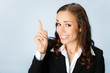 Businesswoman showing blank area for copyspase