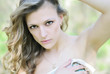 beautiful girl in green wood by summer