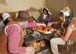 Photo: Thanksgiving pilgrims eating Thanksgiving pilgrims eating