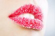 Woman's lips strewed with sugar