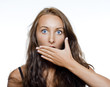 surprised girl covering her mouth
