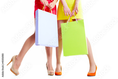 Photo: Holding paperbags Holding paperbags