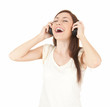 pretty young woman listening to her headphones and singing