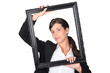 Woman behind black frame