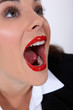 Portrait of woman with mouth open