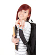 smiling student girl pointing on you, focus on foreground