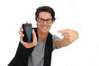 Young man showing smartphone screen to camera