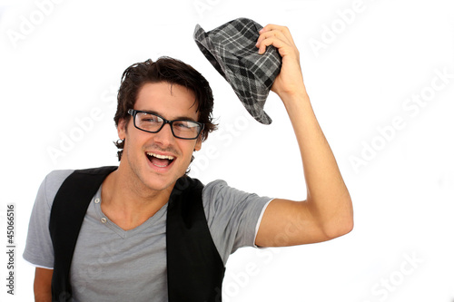Photo: Funky guy wearing hat on white background Funky guy wearing hat on white background