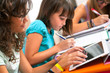 Teenagers doing schoolwork.