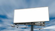 Blank billboard in front of cloudy sky timelapse