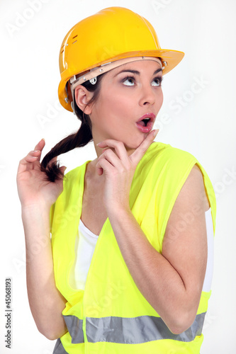 Photo: Woman with yellow helmet Woman with yellow helmet