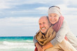 Photo: embracing senior couple embracing senior couple
