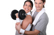 Couple working out with weights