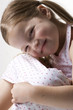 "Girl (4-5) smiling, portrait"