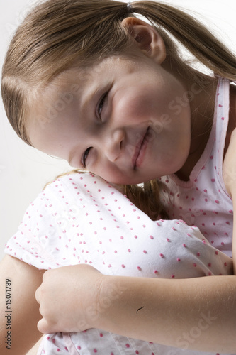 Photo: "Girl (4-5) smiling, portrait" "Girl (4-5) smiling, portrait"