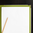 Pencil and blank paper on file